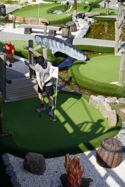 A person golfing.